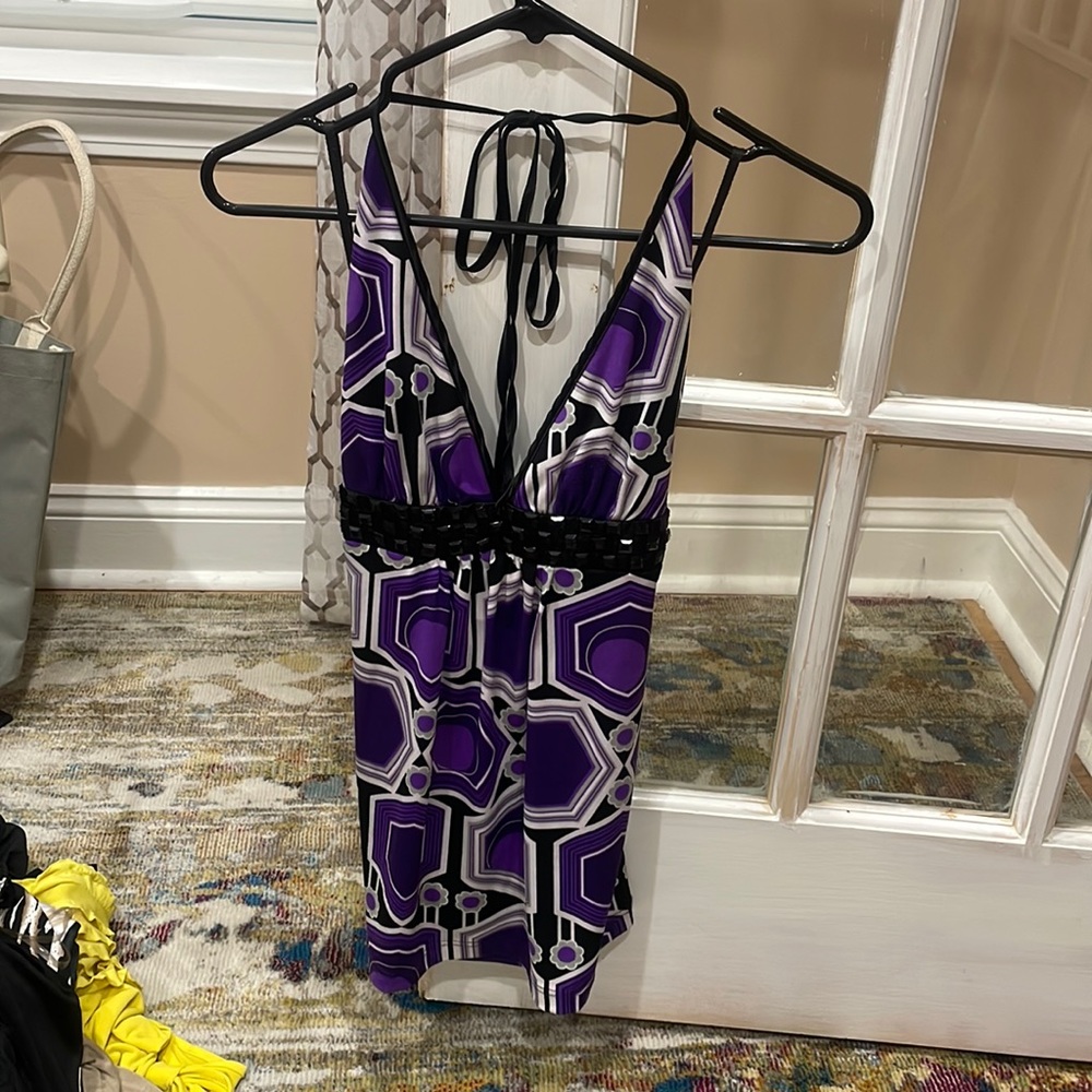 Black and purple halter top with a black needed embezzlement under the bust.